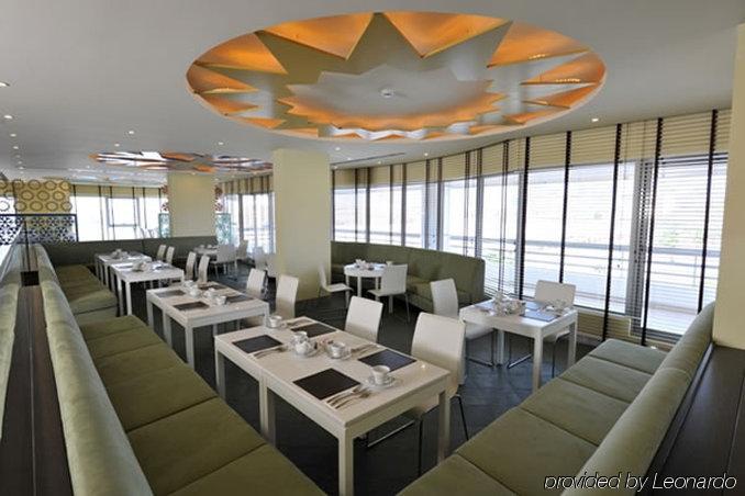 อัลรายาสวีทส์ Hotel มานามา ร้านอาหาร รูปภาพ